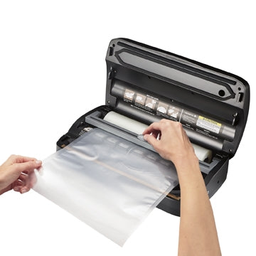 VACUUM SEALER WITH ROLL CUTTER AND STORAGE